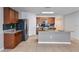 Bright kitchen with stainless steel appliances, a large island, and stylish backsplash at 356 Nova Dr, Davenport, FL 33837