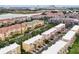 An aerial view of luxury townhomes in a well-maintained community at 4816 Tidecrest Ave # 178, Orlando, FL 32819