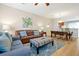 Open-concept living area with comfortable seating, and an adjacent dining space at 4816 Tidecrest Ave # 178, Orlando, FL 32819