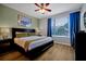 Relaxing main bedroom with a plush bed, ample natural light, and tasteful decor at 4816 Tidecrest Ave # 178, Orlando, FL 32819