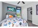 Charming bedroom featuring colorful decor, comfortable bed, and plenty of natural light at 483 Wayland Dr, Haines City, FL 33844