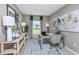Comfortable office space with a large window, modern desk, and stylish decor at 483 Wayland Dr, Haines City, FL 33844