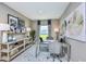 Inviting office space with a large window, contemporary desk, and stylish decor at 483 Wayland Dr, Haines City, FL 33844