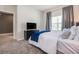 Comfortable Primary bedroom with a queen-sized bed and a view of the door at 4834 Lullaby Ln, Kissimmee, FL 34746