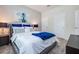 Cozy primary bedroom with a queen bed, stylish side tables, and plenty of space at 4834 Lullaby Ln, Kissimmee, FL 34746