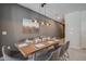 Dining room with modern light fixture and elegant table setting, perfect for entertaining at 4834 Lullaby Ln, Kissimmee, FL 34746