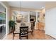 Cozy breakfast nook adjacent to the Gathering room, offering a view of the outdoor patio at 490 Wekiva Preserve Dr, Apopka, FL 32712