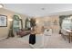 Open-concept living and dining room features stylish furniture, decor, and natural light at 490 Wekiva Preserve Dr, Apopka, FL 32712