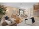 Inviting living room featuring stylish furnishings, neutral tones, and a seamless flow to the dining area at 490 Wekiva Preserve Dr, Apopka, FL 32712