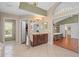 A spacious primary bath with double sinks, tile floors, and walk in closet at 490 Wekiva Preserve Dr, Apopka, FL 32712