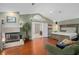 Inviting main bedroom with fireplace, ensuite bathroom, and comfortable sleeping space at 490 Wekiva Preserve Dr, Apopka, FL 32712