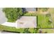 A bird's-eye view shows the house, driveway, yard and the neighborhood at 608 Ashwell Ct, Debary, FL 32713