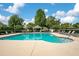 Community pool featuring clear blue water, surrounded by lounge chairs and well-maintained landscaping at 608 Ashwell Ct, Debary, FL 32713