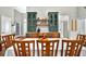 Dining room area with wood floors and custom cabinets at 641 Lakescape Ct, Orlando, FL 32828