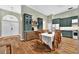 Elegant dining room with custom cabinets, hardwood floors, and abundant natural light at 641 Lakescape Ct, Orlando, FL 32828