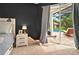 A bright main bedroom boasts a sliding glass door with access to a screened-in patio and pool at 641 Lakescape Ct, Orlando, FL 32828