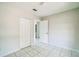 Bright bedroom with a closet and tile flooring for easy maintenance at 657 Mckinley Ct, Kissimmee, FL 34758