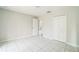 Bright bedroom with a closet and tile flooring for easy cleaning at 657 Mckinley Ct, Kissimmee, FL 34758