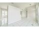 Spacious area with an open concept and tile flooring throughout at 657 Mckinley Ct, Kissimmee, FL 34758