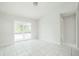 Bright room with tile flooring and access to the screened patio at 657 Mckinley Ct, Kissimmee, FL 34758