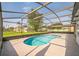 Enjoy outdoor living with this screened-in kidney shaped pool, a perfect backyard oasis at 657 Mckinley Ct, Kissimmee, FL 34758
