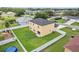 Backyard view features a fenced yard, shed, and plenty of green space at 670 Bluebill Ct, Poinciana, FL 34759