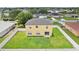 Backyard view features a fenced yard, shed, and plenty of green space at 670 Bluebill Ct, Poinciana, FL 34759