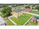 Backyard view features a fenced yard, shed, and plenty of green space at 670 Bluebill Ct, Poinciana, FL 34759