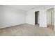 Neutral bedroom with carpet and a closet with an open door at 670 Bluebill Ct, Poinciana, FL 34759