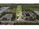 Expansive aerial view showcasing the property's boundaries and surrounding greenery at 6957 Plymouth Sorrento Rd, Apopka, FL 32712