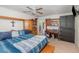 Bedroom with a ceiling fan and natural light offers a comfortable and inviting atmosphere at 6957 Plymouth Sorrento Rd, Apopka, FL 32712