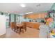 Spacious eat-in kitchen with lots of cabinets and a cozy dining area with a table at 6957 Plymouth Sorrento Rd, Apopka, FL 32712