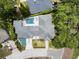 Aerial view of the property showcasing the pool, extensive backyard, and surrounding neighborhood at 7 Ne Ivanhoe Blvd, Orlando, FL 32804