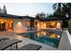 Resort-style backyard features a pool, fire pit, and outdoor kitchen at 7 Ne Ivanhoe Blvd, Orlando, FL 32804