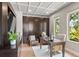 Comfortable home office featuring custom built-ins, a modern desk, and natural light at 7 Ne Ivanhoe Blvd, Orlando, FL 32804