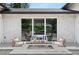 Inviting outdoor patio area with a fire pit and comfortable seating, perfect for entertaining at 7 Ne Ivanhoe Blvd, Orlando, FL 32804