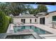 Backyard pool area featuring in-ground spa and outdoor kitchen at 7 Ne Ivanhoe Blvd, Orlando, FL 32804