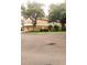 Multi-story home with a two-car garage and well-kept lawn at 725 Ashworth Overlook Dr # C, Apopka, FL 32712