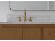 Close-up of the vanity featuring a modern faucet and a clean countertop at 7646 Coconut Creek Ct, Orlando, FL 32822