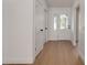 Inviting entryway with decorative glass doors and ample lighting at 7646 Coconut Creek Ct, Orlando, FL 32822