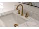 Close-up of the stylish faucet with water running into a modern sink at 7646 Coconut Creek Ct, Orlando, FL 32822
