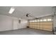 Clean, two-car garage with ample space, good lighting, and neutral tones at 7646 Coconut Creek Ct, Orlando, FL 32822