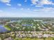 Aerial view of Heathrow, showcasing the home's location in a green suburban neighborhood at 811 Sherbourne Cir, Lake Mary, FL 32746