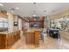 Large kitchen flows into a living area, complete with an eat-in bar and breakfast nook at 1010 Juliette Blvd, Mount Dora, FL 32757