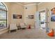 Inviting sitting room with comfortable seating, natural light, and elegant decor at 1010 Juliette Blvd, Mount Dora, FL 32757