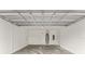 Spacious two-car garage with a clean, white interior and high ceilings at 1113 Naples Dr, Orlando, FL 32804