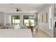 Bright living area featuring a dining space, seamless indoor-outdoor flow via sliding glass doors at 1113 Naples Dr, Orlando, FL 32804