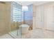 Elegant bathroom featuring freestanding tub, glass shower, and sophisticated tile work at 11721 Camden Park Dr, Windermere, FL 34786