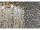 Close up of an elegant chandelier with decorative gold branches and crystal leaf design at 11721 Camden Park Dr, Windermere, FL 34786