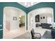 Open-concept design with arched openings leading to the dining and living spaces at 11721 Camden Park Dr, Windermere, FL 34786